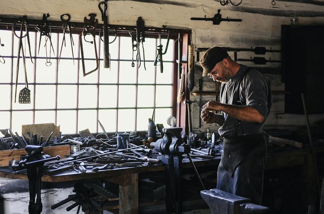 craftsman working with traditional tools
