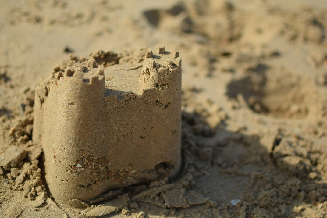 kids building sandcastle